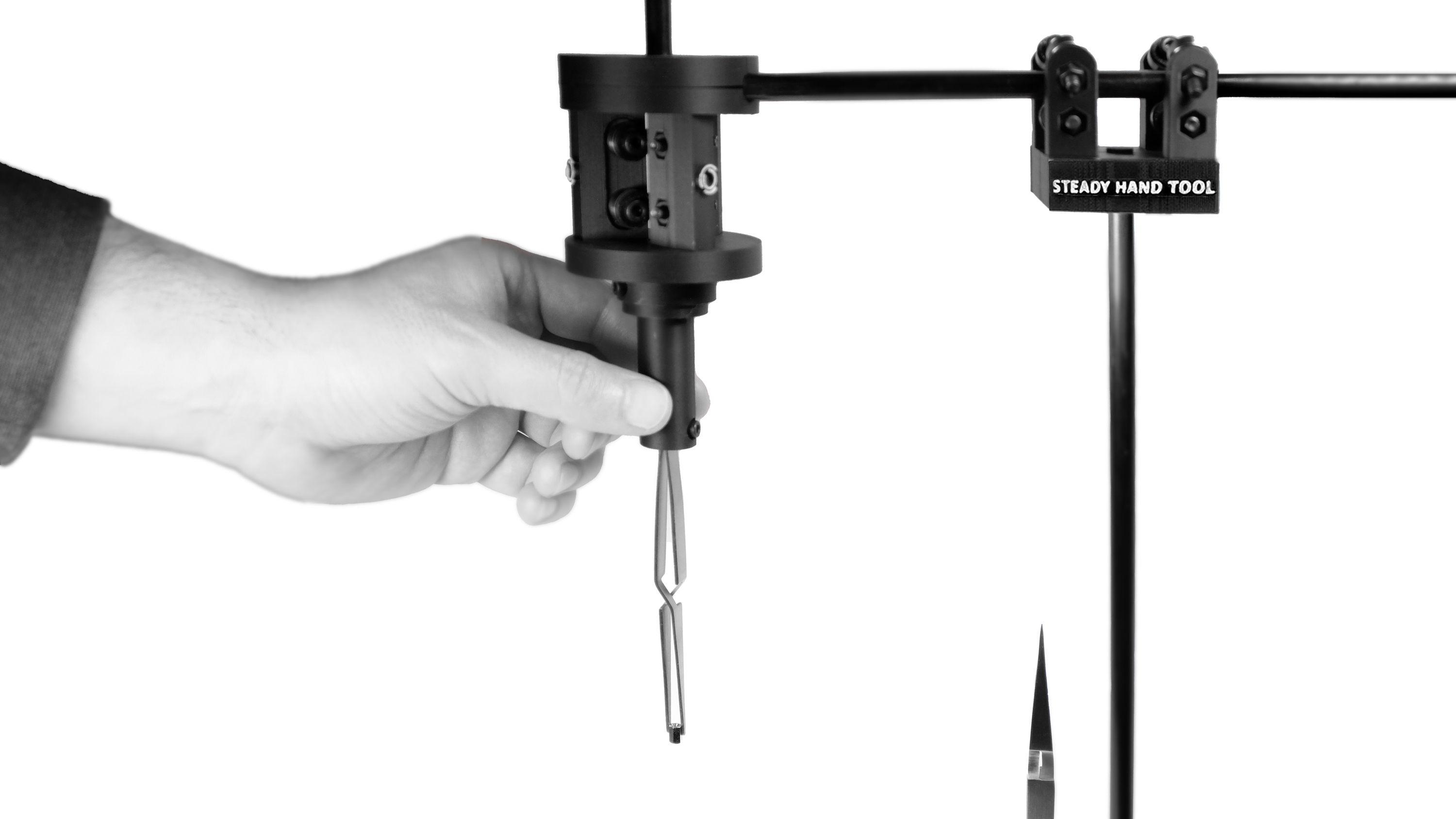 SteadyHandTool in use — hand holding the tool